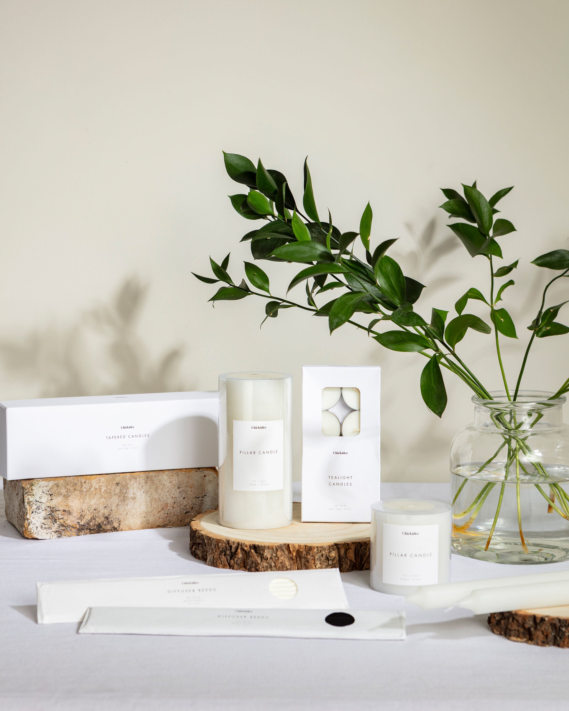 Chickidee Scents Base Range - Group Shot with white candles 2